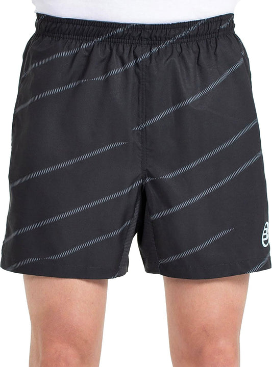 A person wearing Bullpadel Cabanas Mens Padel Shorts - Black, seen from waist to mid-thigh; these athletic shorts by Bullpadel are designed for optimal comfort and court performance.