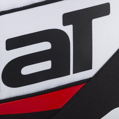 Close-up of the Babolat RH Pro Technical Padel Racket Bag (White/Black/Red) shows its ribbed white surface with bold black "aT" lettering and diagonal black and red lines, reflecting Babolat's premium padel accessories design.