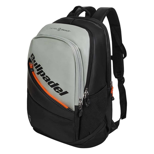 The Bullpadel BPM26002 Hack Padel Backpack - Grey features multiple zippered compartments, orange accents, mesh side pockets, and padded straps. Inspired by Paquito Navarro. Brand: Bullpadel.