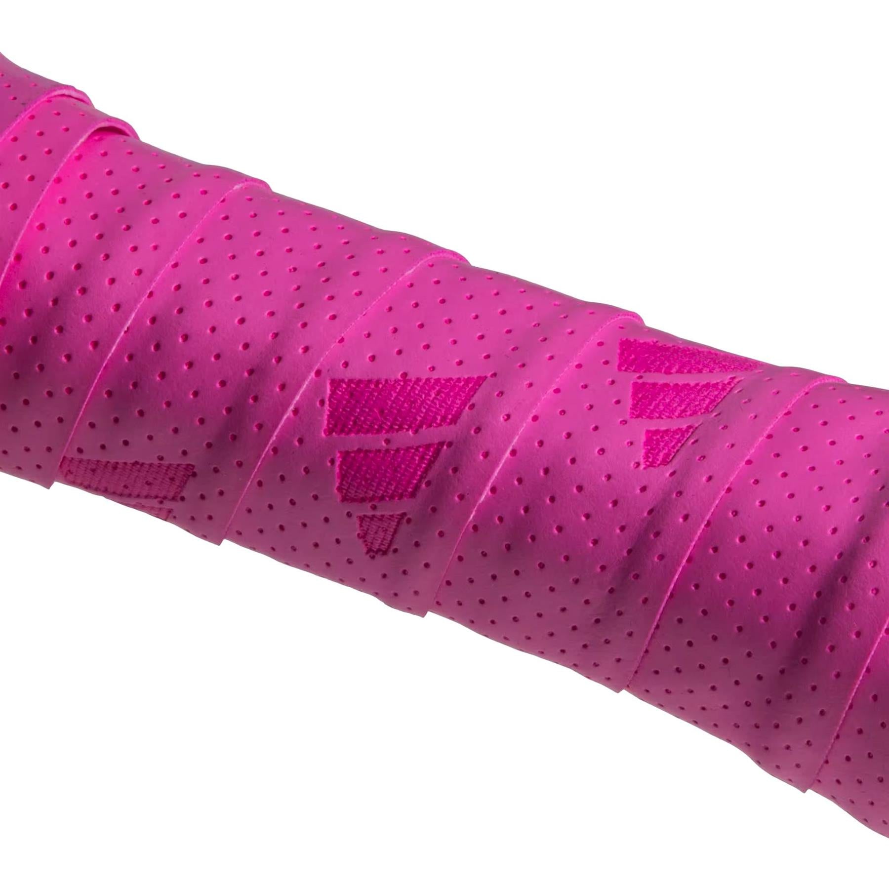 Close-up of adidas ADIDAS Padel Overgrips (3 Pack) in pink, featuring a perforated design and angular texture for improved comfort and performance.