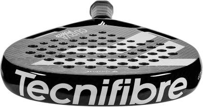 Featuring a close-up of the Tecnifibre Curva Power 2026 Padel Racket in black, this racket displays a textured surface with multiple round holes and is equipped with a gray grip handle. The brand name “Tecnifibre” is prominently printed in large white letters on the frame, emphasizing its signature power-focused design.