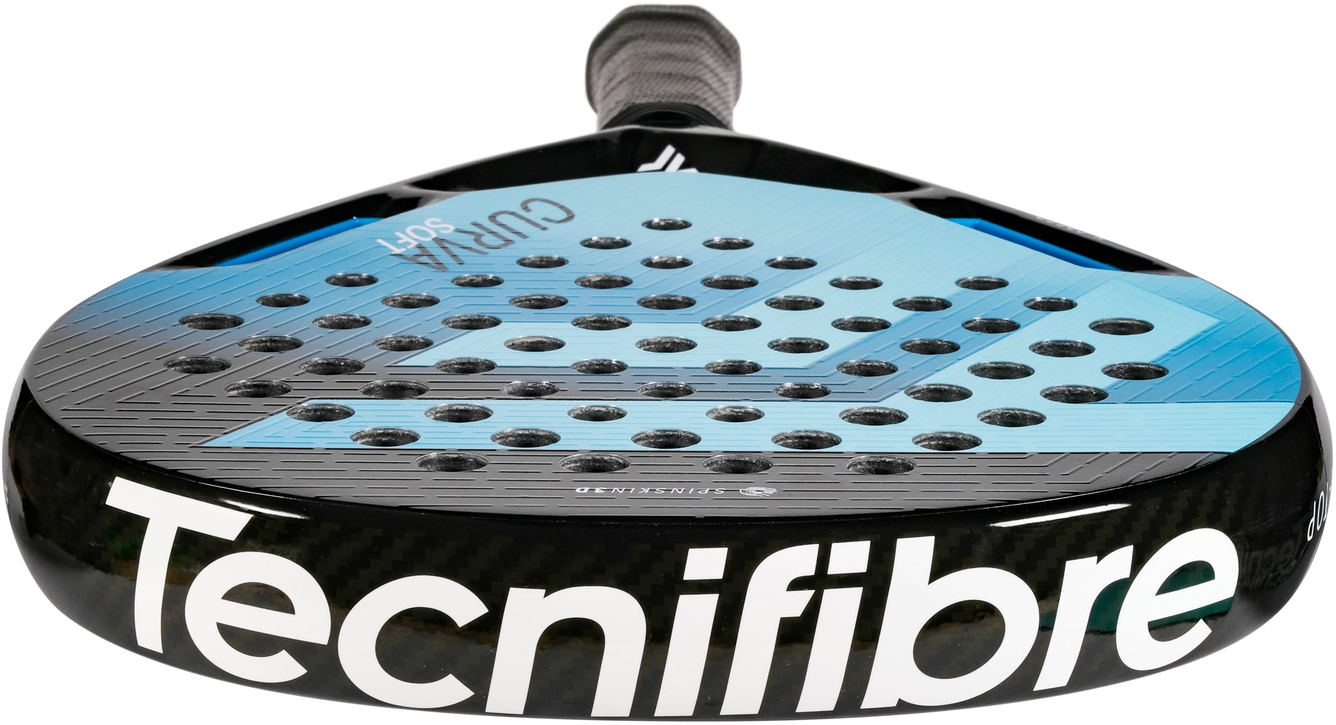 A detailed view of the Tecnifibre Curva Soft 2026 Padel Racket by Tecnifibre showcases its black and blue color scheme, teardrop-shaped head, numerous circular perforations on the striking surface, and a textured handle.