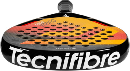 A close-up of the Tecnifibre Curva Speed 2026 Padel Racket by Tecnifibre, showcasing its black frame with striking white branding and an eye-catching red, orange, and yellow design accented with perforations—engineered for players seeking enhanced control and quick maneuverability on the court.