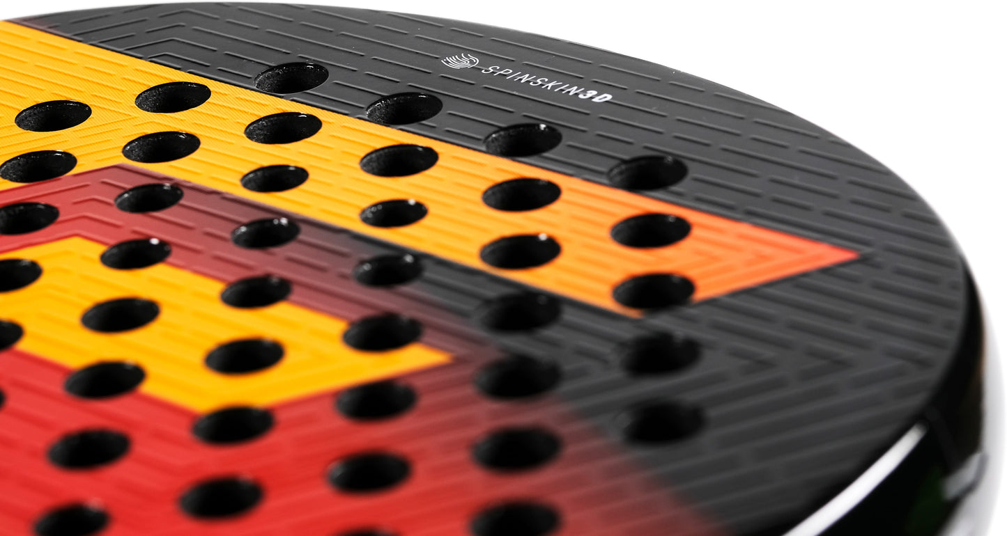 Close-up of the Tecnifibre Curva Speed 2026 Padel Racket by Tecnifibre, a black padel racket with red and yellow geometric accents, a textured surface, and circular holes designed for enhanced control and fast hand movement. The “SPINSKIN 360” text is visible near the top edge.