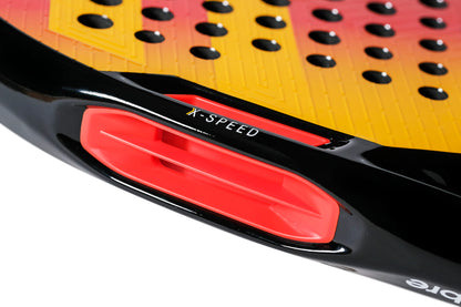 Close-up of the Tecnifibre Curva Speed 2026 Padel Racket by Tecnifibre, featuring a striking black and yellow surface with a distinctive red vent marked “X-SPEED” on the side—engineered for players who prioritize control and quick reactions.
