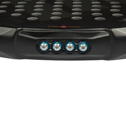 Close-up of the ADIDAS Metalbone 3.4 padel racket in black and white, featuring a textured surface and four hexagonal weight adjustments with blue rims near the base, ideal for advanced players wanting customized weight distribution.