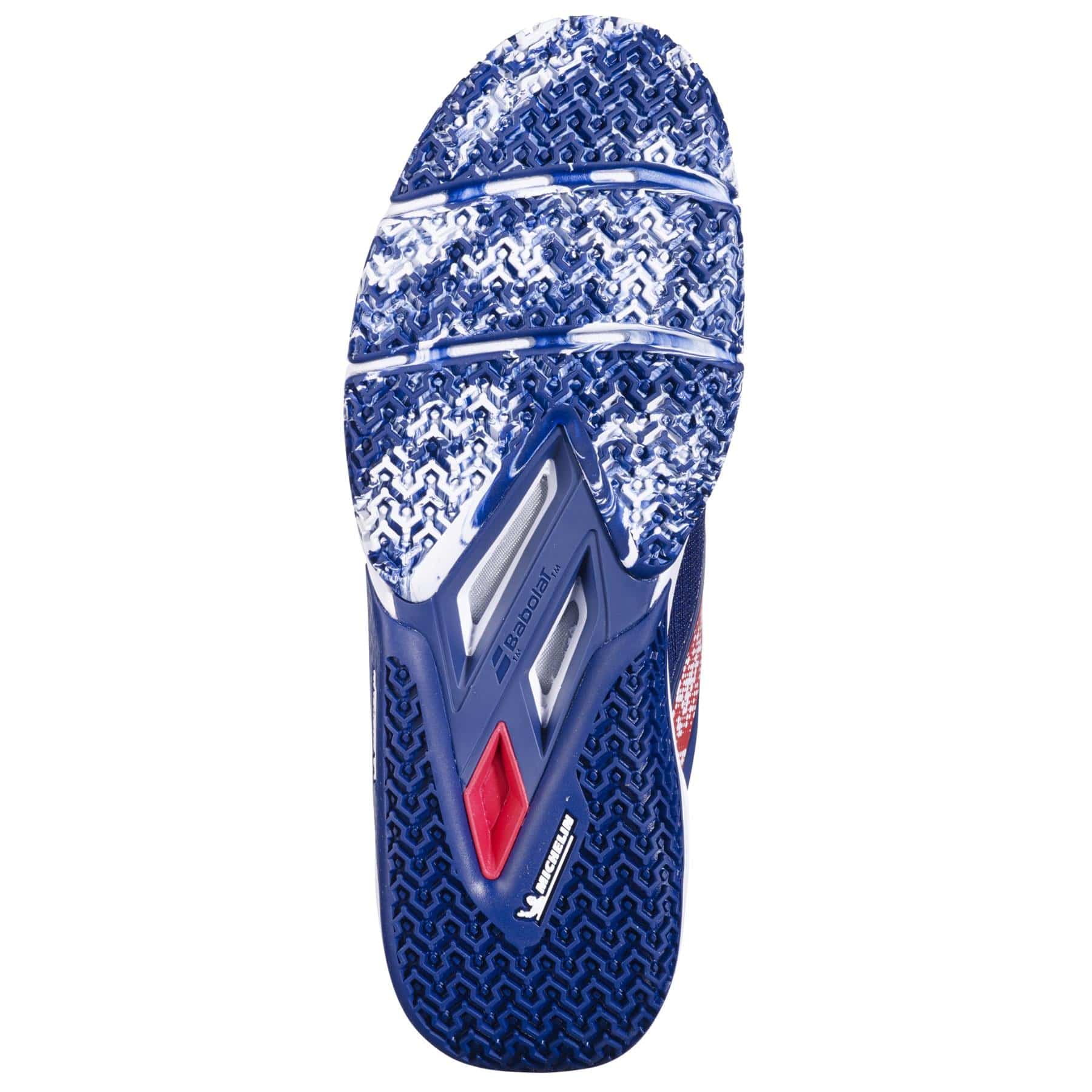 The image displays the Babolat Movea 2 Mens Padel Shoes in dark blue and chilli red, featuring a textured Michelin sole for grip and visible Babolat branding.