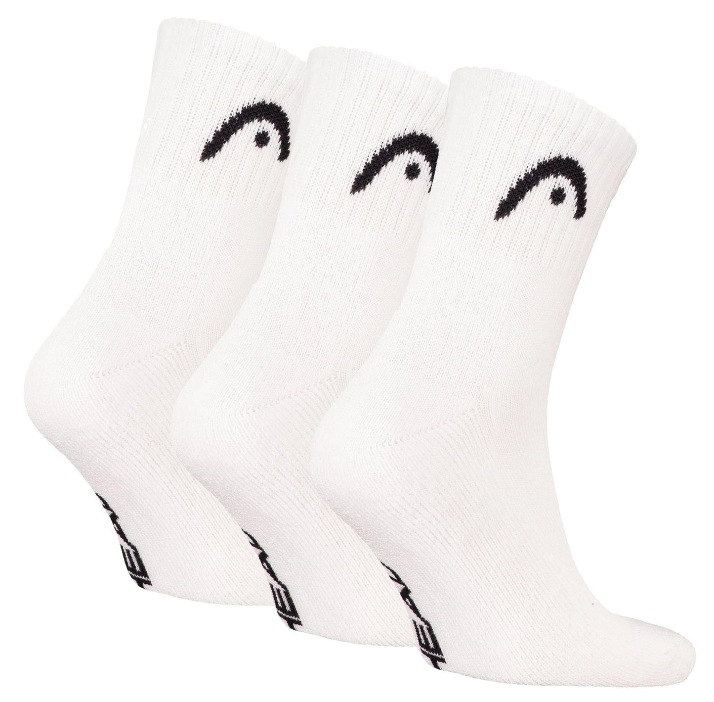 Three pairs of HEAD Club Short Crew Padel Socks in white, each with a black curved logo near the top and black text on the sole, made from soft cotton for comfort. Brand: HEAD. Displayed side by side against a white background.