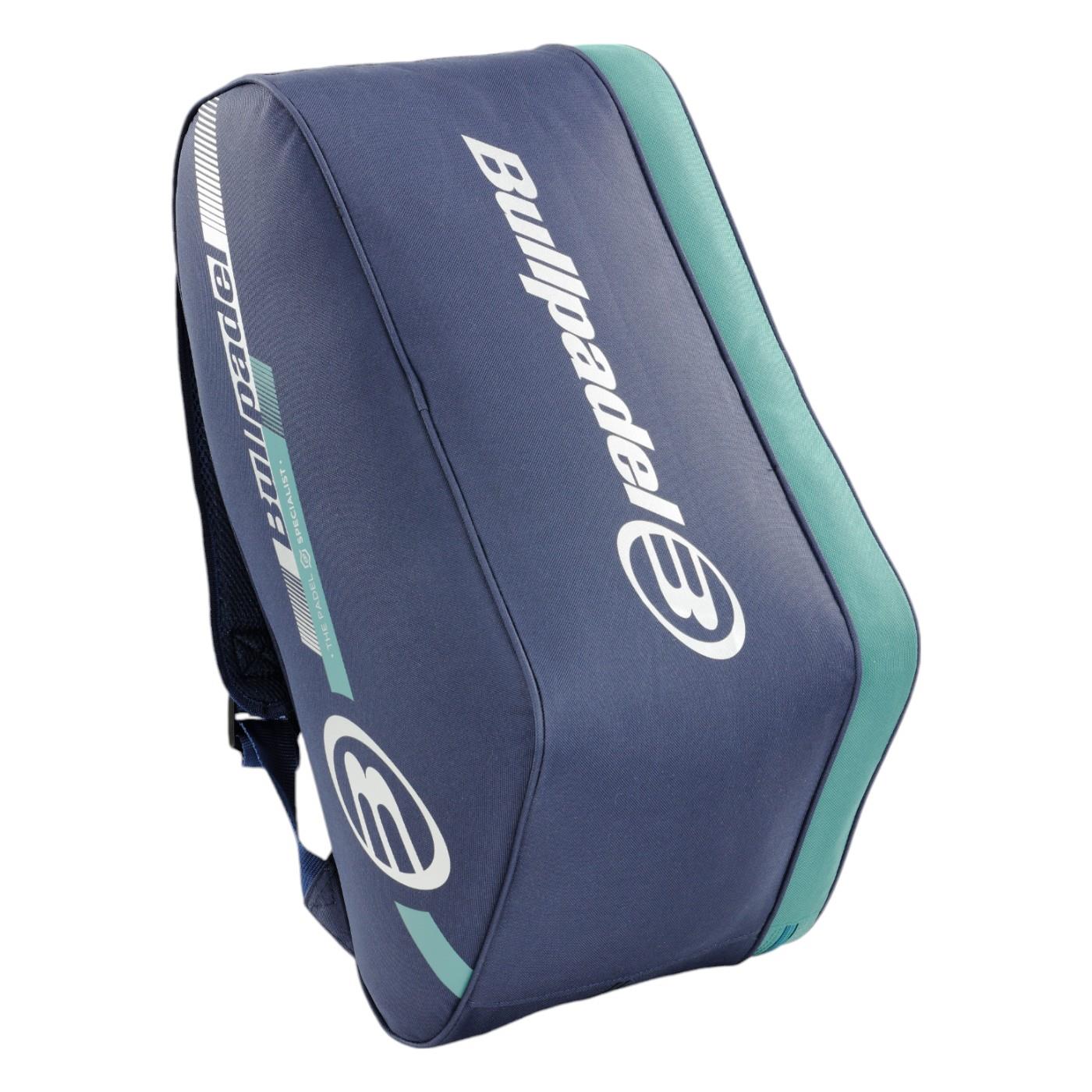 The Bullpadel Tour 25 Padel Racket Bag in navy, featuring the iconic logo, offers a spacious zippered compartment, a padded racket compartment, and a convenient shoulder strap for easy carrying.