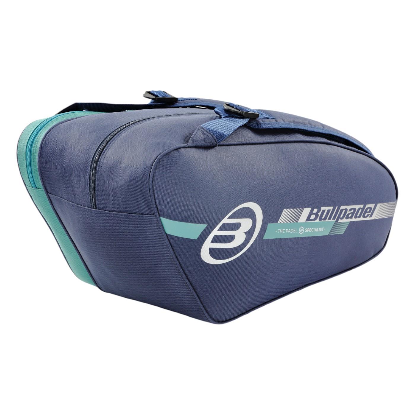 The Bullpadel Tour 25 Padel Racket Bag in navy features a spacious main compartment, prominent side logo, and a sleek design with two shoulder straps and a padded racket section, making it ideal for athletes on the move.
