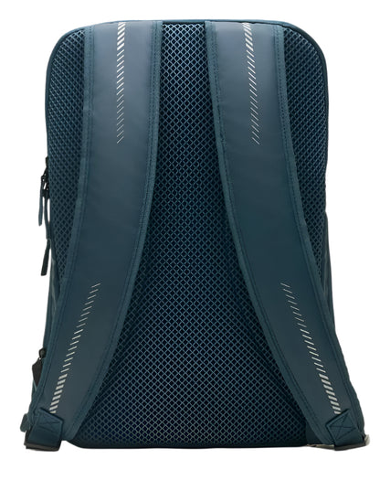 The image displays the back view of a navy Kanso Intuko Padel 23L Backpack, featuring a ventilating mesh panel and two adjustable straps with reflective stripes.