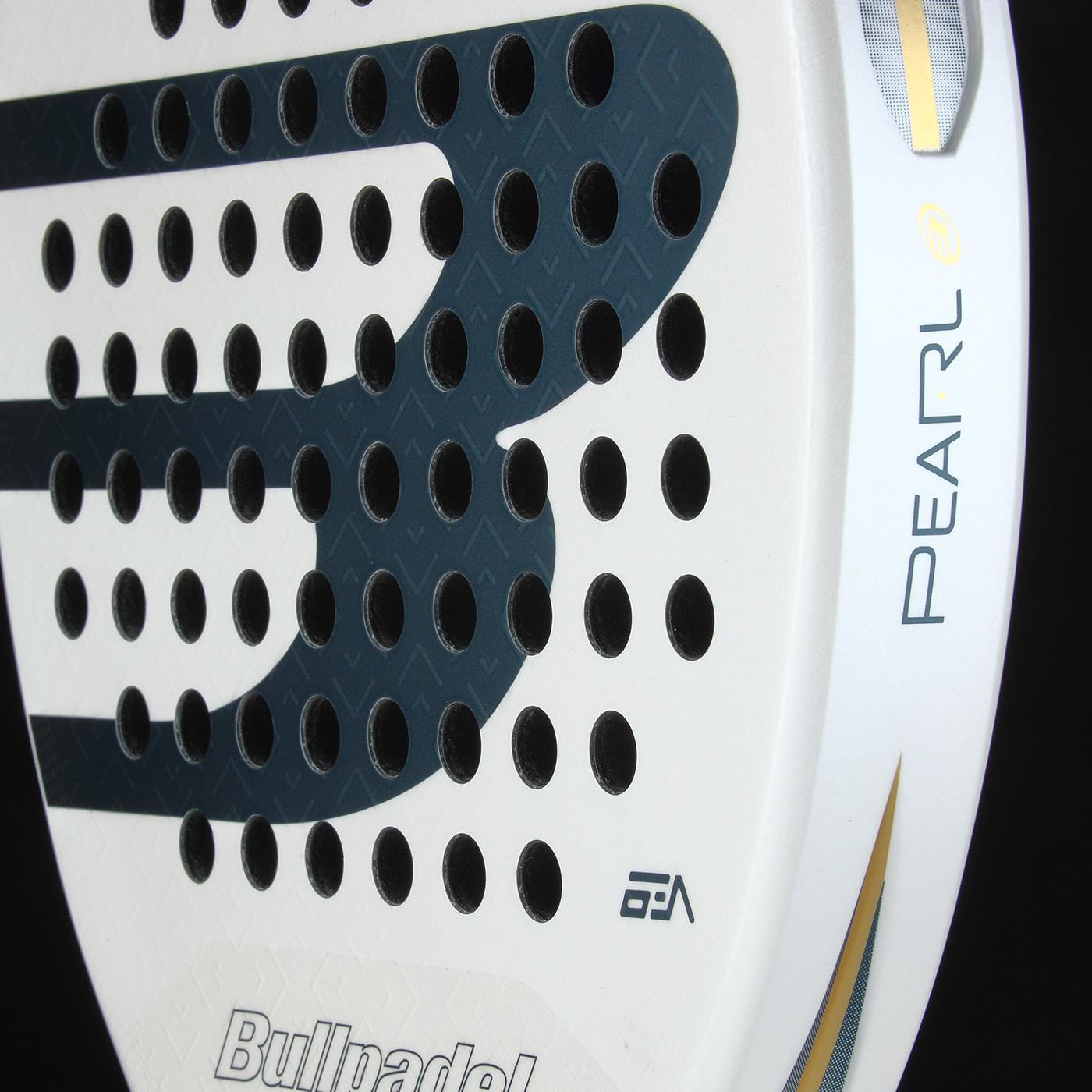 Close-up of the lightweight Bullpadel Pearl 2026 Padel Racket - White by Bullpadel, featuring black circular holes, gold accents, and "PEARL" logo—designed for injury prevention—set against a black background.