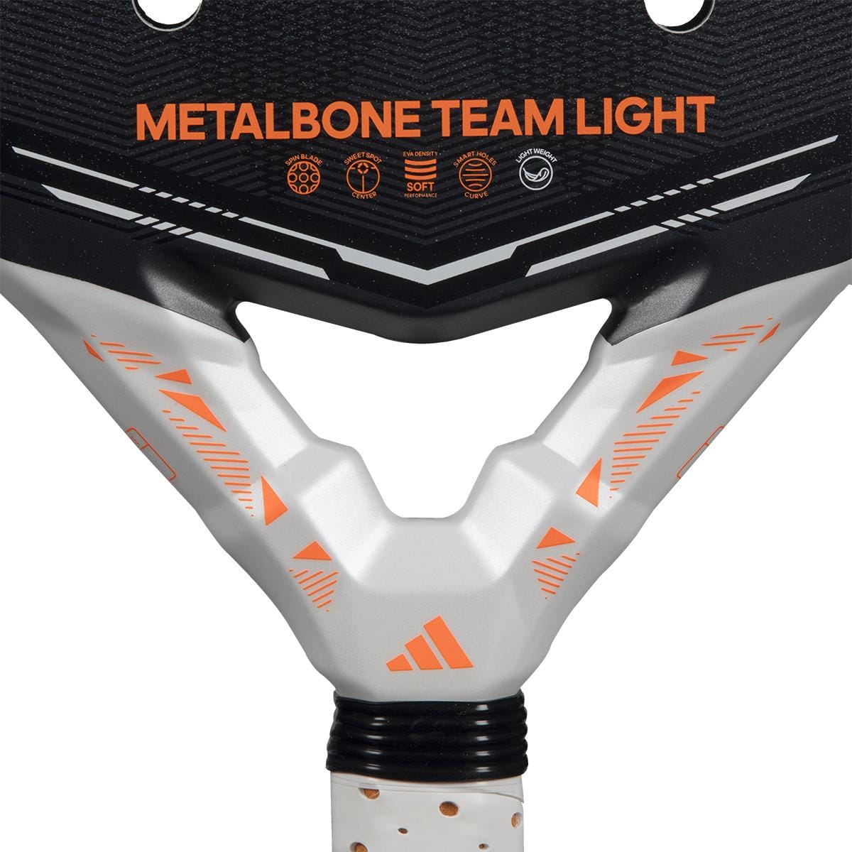 Close-up of the adidas Metalbone Team Light 2026 Padel Racket in black, featuring "METALBONE TEAM LIGHT" in orange. The handle showcases white and orange geometric patterns with the adidas logo—designed for advanced players.