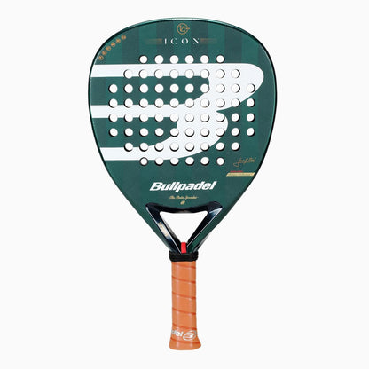 The Bullpadel Icon 2026 Padel Racket - Green, inspired by Juan Martín Díaz, features a large white "B" logo, round face holes, and an orange grip handle.