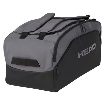 The HEAD Pro X Padel Duffle Bag in black and dark grey is an eco-friendly sports bag crafted from recycled PET bottles. Featuring the brand name "HEAD" in white, it offers multiple compartments and adjustable straps for easy carrying.