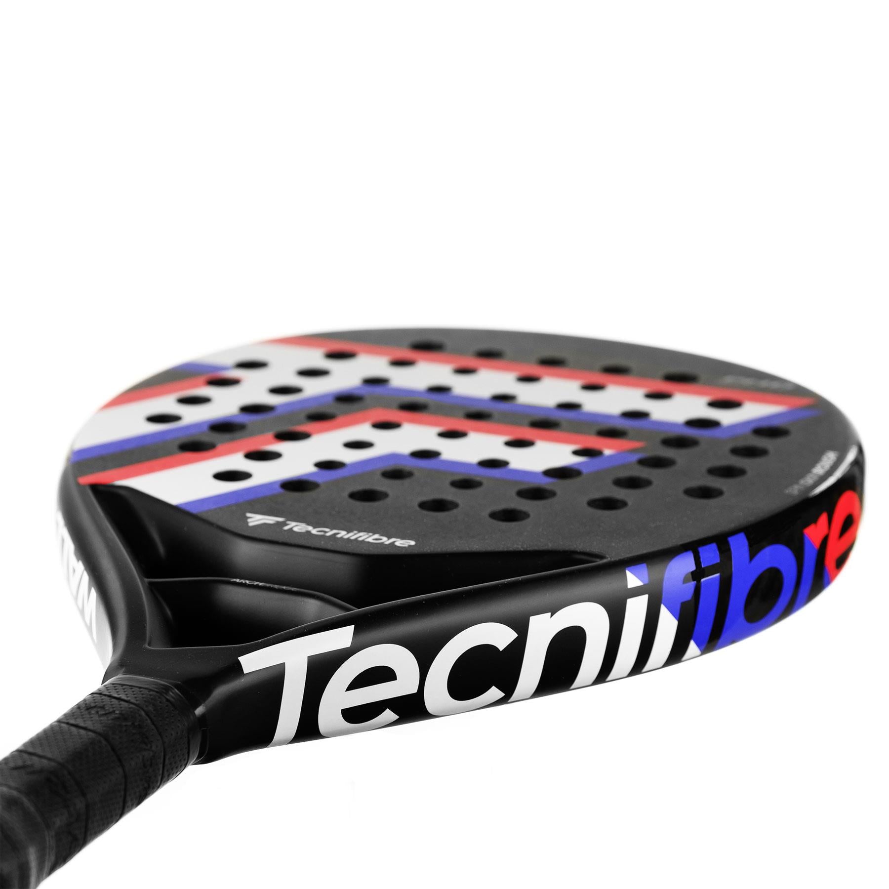 Close-up of the Tecnifibre Wall Master 365 Padel Racket in black, featuring a perforated surface. Its carbon fiber handle is wrapped, with red, white, and blue geometric patterns on the face for precision and control. The brand "Tecnifibre" is displayed prominently on the side.