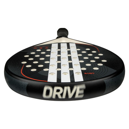 The adidas Drive Black 3.4 Padel Racket is designed for beginners, featuring a black and white look with circular holes, bold white "DRIVE" lettering near the bottom, fibreglass construction, and red-white accents on its dark surface.