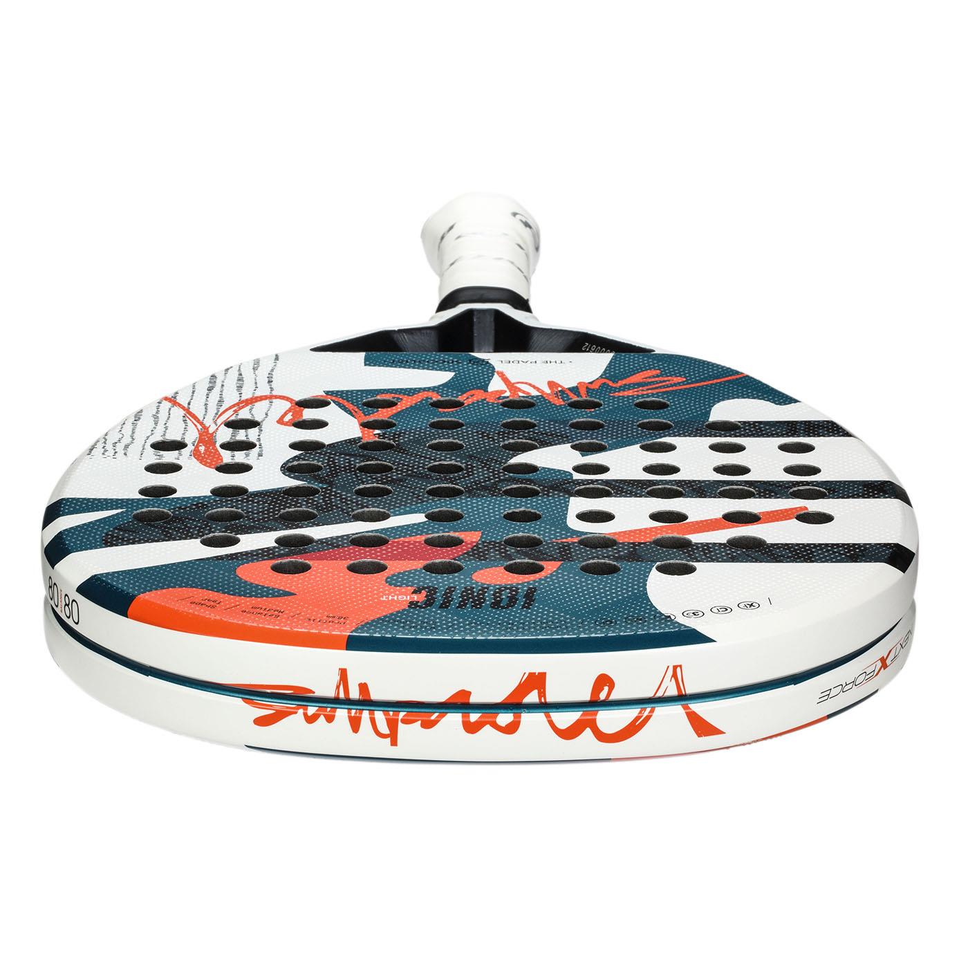 The Bullpadel Ionic Light 2025 Padel Racket features a round black perforated surface with blue, white, and orange abstract designs. Ideal for advanced players, it has a white handle with a black logo near the base.