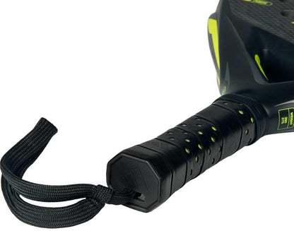 Close-up of the adidas Arrow Hit 2026 Padel Racket handle, featuring a textured grip, neon green accents, black wrist strap, and an intelligent balance system for powerful padel play.