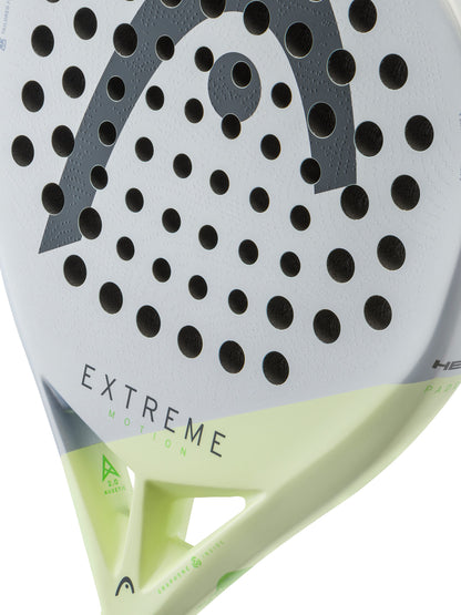 Close-up of the HEAD Extreme Motion 2026 Padel Racket in white and light green, featuring black circular holes, the word “EXTREME,” and the HEAD logo. Designed for advanced players seeking precision and performance on the padel court.