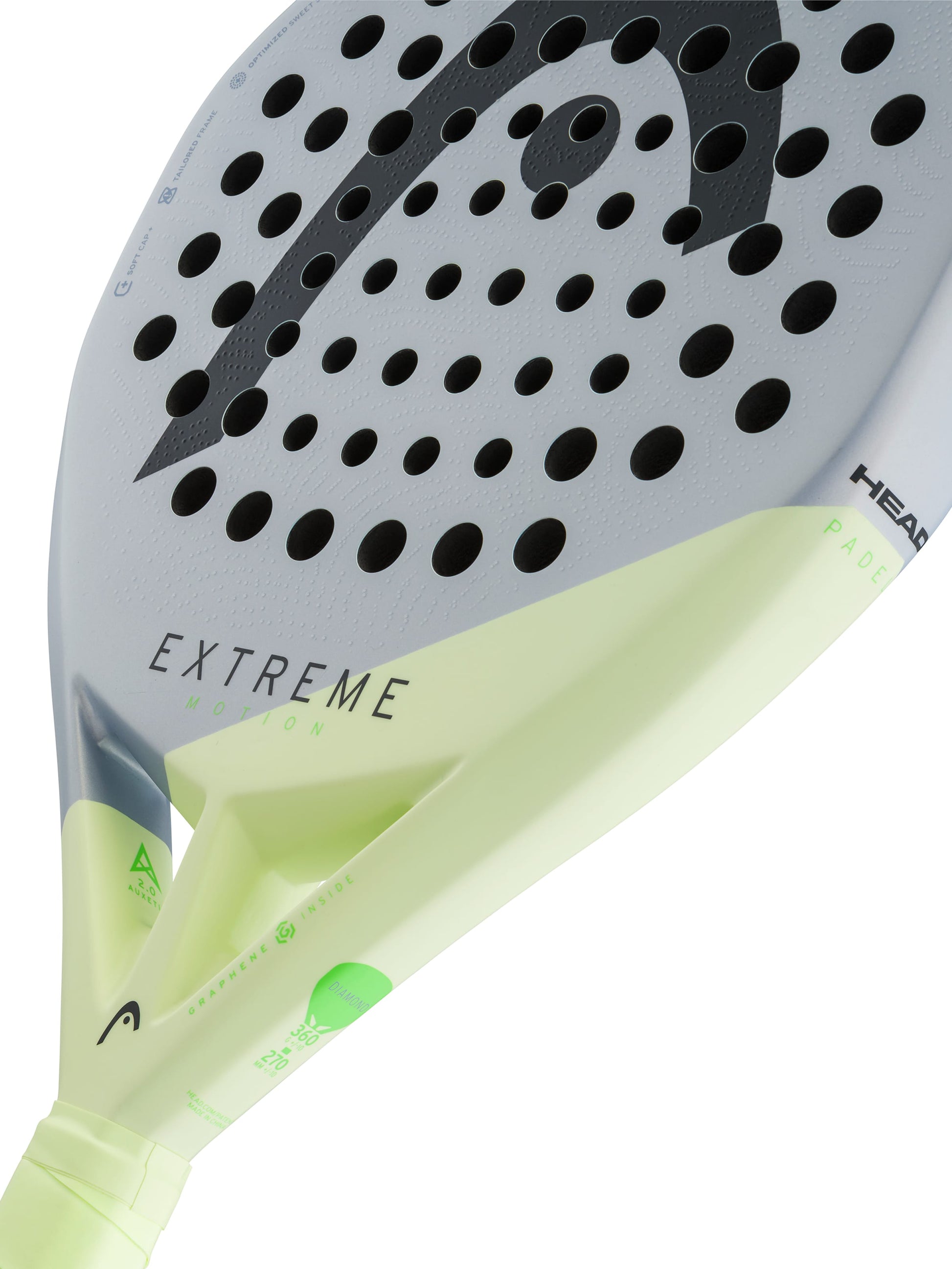 Featuring a close-up of the HEAD Extreme Motion 2026 Padel Racket by HEAD, this racket showcases a sleek gray and light yellow design with the word “EXTREME” and distinctive circular holes on its face. Designed for advanced padel players, it delivers powerful performance on the court.