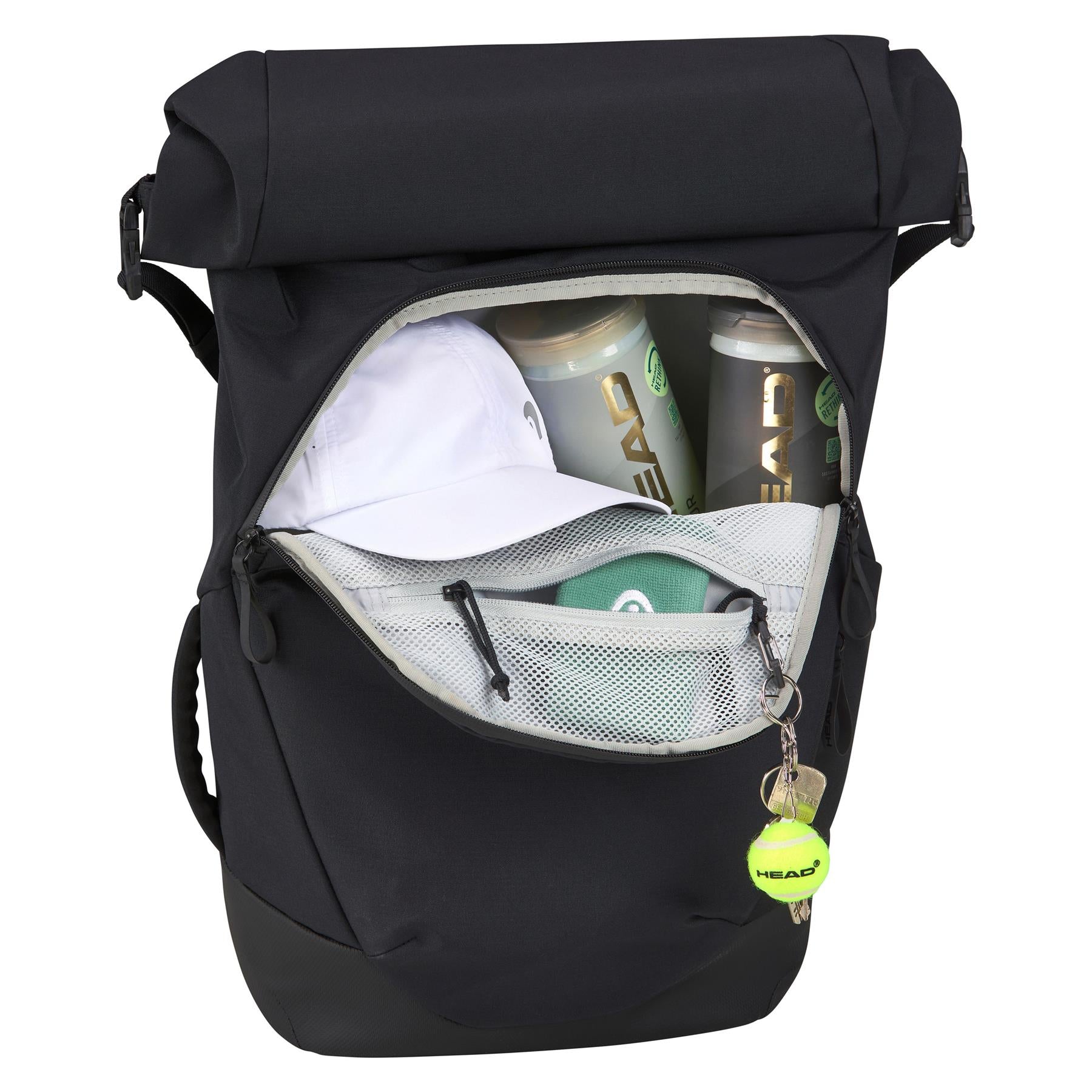 The HEAD Pro X Raqpack Padel Backpack - Black by HEAD features a front pocket that unzips to reveal two tennis ball canisters, a white cap, and a mesh pouch holding keys with a tennis ball keychain.