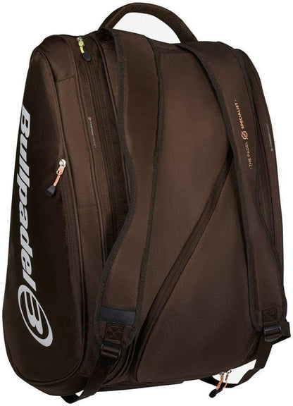 The Bullpadel BPP26024 Wonder 2026 Padel Racket Bag - Chocolate is a large bag with two padded shoulder straps, multiple zippered compartments (including thermal ones), and features the Bullpadel logo in white on the side.