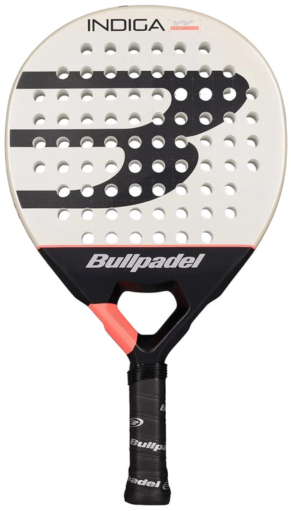 The Bullpadel Indiga W 2026 Padel Racket is a lightweight women's racket with a white face, bold black and gray graphics, a black handle with pink at the neck, and "Bullpadel" displayed on the throat.