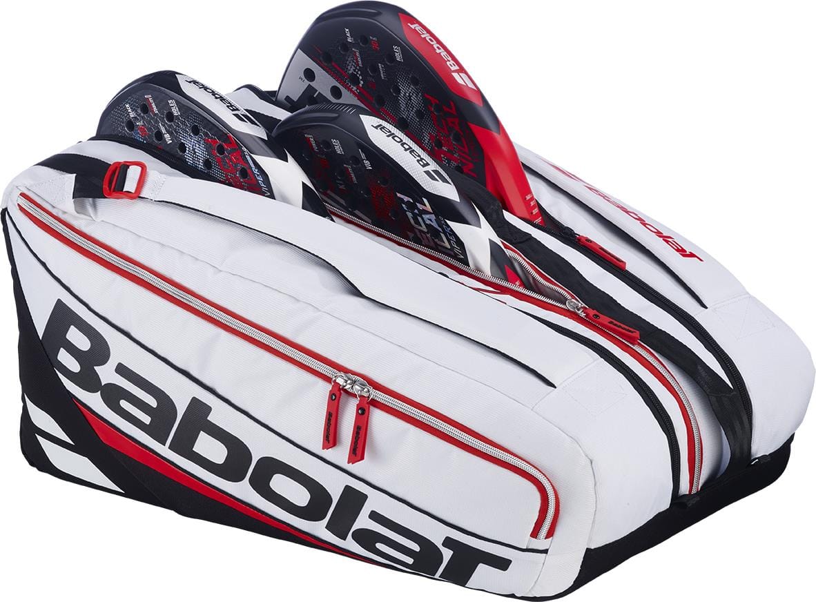 The Babolat RH Pro Technical Padel Racket Bag in white, black, and red holds two rackets and features large side pockets and zippers—ideal for carrying your padel accessories with style.