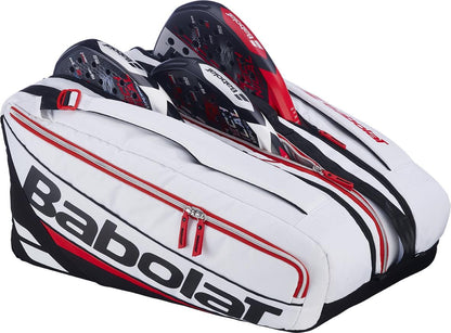 The Babolat RH Pro Technical Padel Racket Bag in white, black, and red holds two rackets and features large side pockets and zippers—ideal for carrying your padel accessories with style.