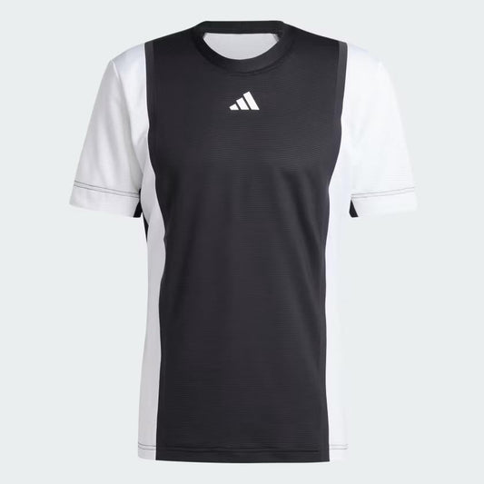 Introducing the adidas Men's Pro Freelift 3D Padel T-Shirt in black and white, this athletic tee features HEAT.RDY technology with short sleeves and a discreet chest logo, making it perfect for keeping cool during high-intensity workouts. It's an essential addition to the adidas Men’s Pro Freelift 3D athletic wear collection.
