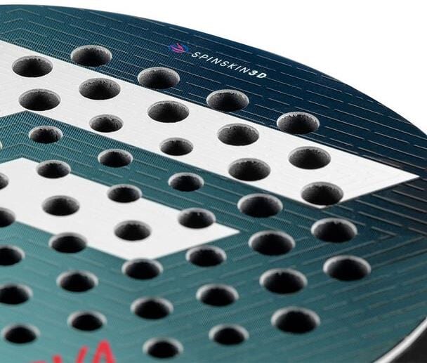 Close-up of the Tecnifibre Curva Team Padel Racket - Black / Blue by Tecnifibre, highlighting its perforated holes, textured surface, and "Spin Skin 3D" printed near the edge.
