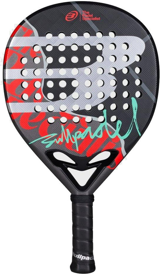 The Bullpadel Ionic Control 2026 padel racket features a black design with white and red accents, green signature-style text, multiple round holes, and a black grip. Designed for control and precision, "bullpadel" is printed at the bottom.