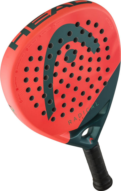 The HEAD Radical Team 2026 Padel Racket in orange and green features a perforated face, black grip handle, and prominent brand logo—ideal for intermediate to advanced players.