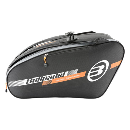 The Bullpadel Tour 25 Padel Racket Bag in black features vibrant orange accents and the iconic Bullpadel logo. It offers multiple zippered compartments, a padded racket section, and an aerodynamic design for sleek storage.