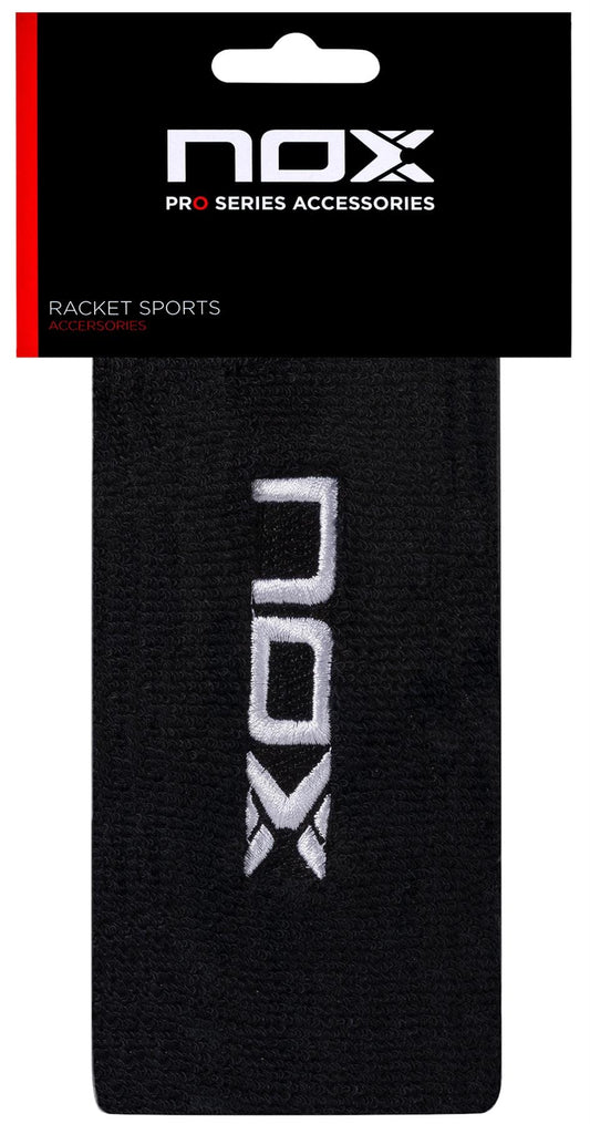 The NOX Padel Long Wristband in black/white offers wrist protection for racket sports, features the embroidered NOX logo, is displayed in original packaging, and uses Balance Fresh technology for comfort.