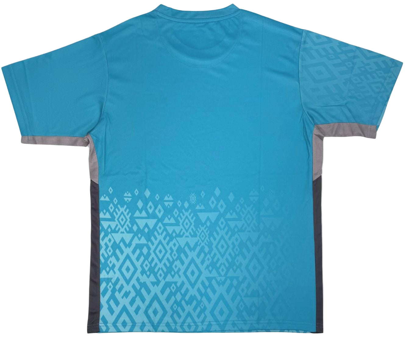 The Yonex YTM11 Mens Padel T-Shirt in Blue Sea is a short-sleeved, quick-dry athletic shirt with gray accents and a geometric tribal pattern near the bottom and sleeves, shown from the back against a white background.