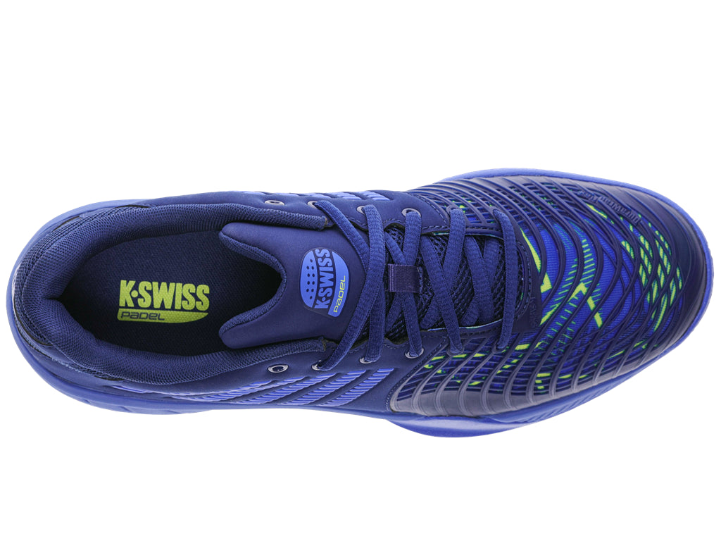 Seen from above, these blue athletic shoes showcase a patterned design with green accents. They feature dark laces and have the "K-Swiss" logo visible on the insole. Designed for indoor court sports like padel, they are equipped with DuraWrap Flex technology in the sole for enhanced performance. The product is officially called K-Swiss Express Light 3 HB Men's Padel Shoes in Dazzling Blue, Estate Blue, and Evening Primrose.