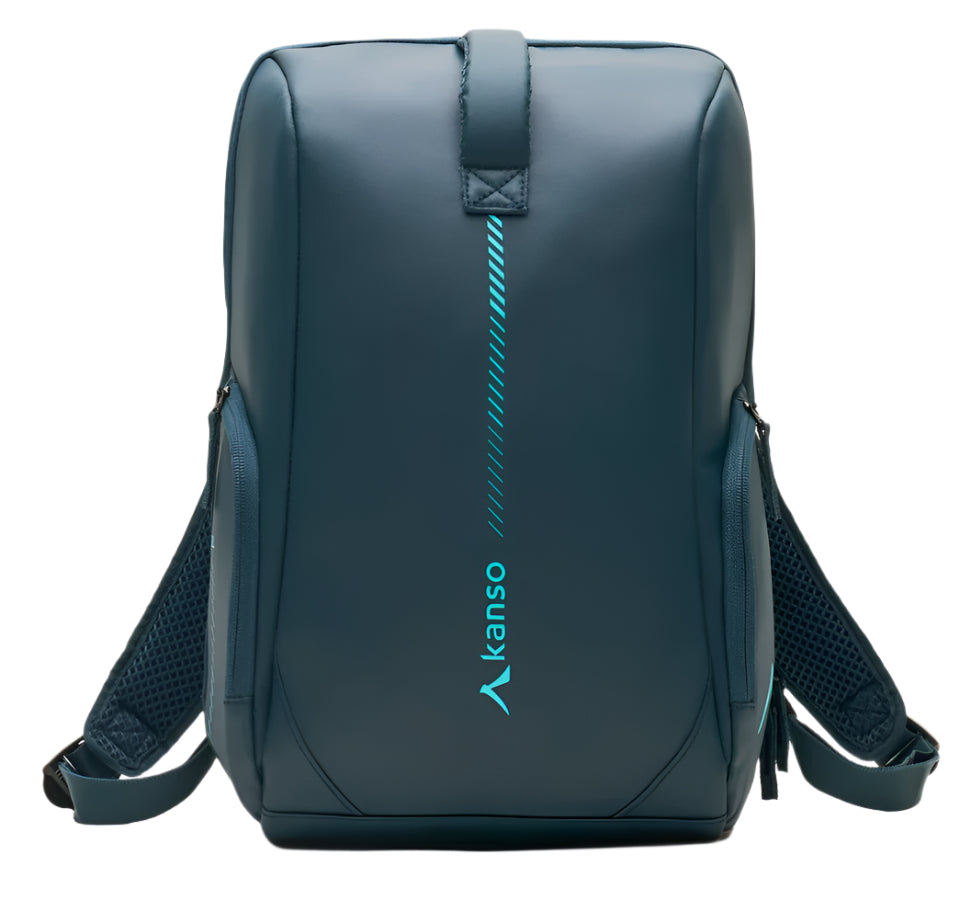 The Kanso Intuko Padel 23L Backpack in navy showcases a sleek design with a vertical turquoise stripe and logo, featuring mesh and padded shoulder straps for comfort. A reflective print enhances visibility, making its modern minimalist style ideal for any setting.