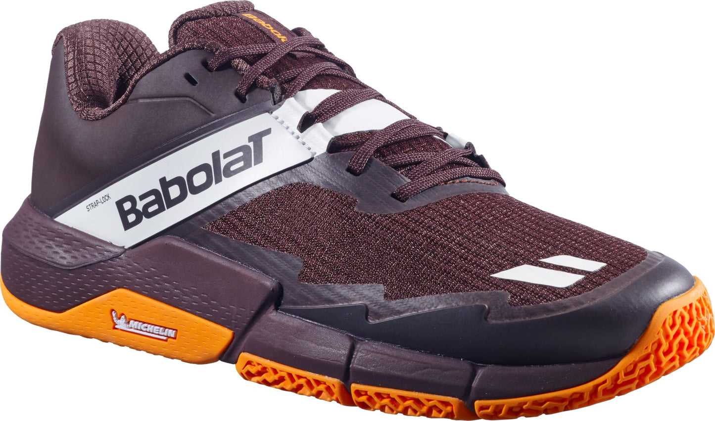 Introducing the Babolat Movea 2 Men's Padel Shoes in brown and cream, featuring a stylish mesh upper, signature white Babolat logo, and durable Michelin-branded sole—ideal for players seeking high-performance men's padel shoes or versatile footwear for the padel court. Displayed against a clean white background, these shoes seamlessly blend style with performance.