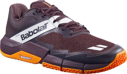 Introducing the Babolat Movea 2 Men's Padel Shoes in brown and cream, featuring a stylish mesh upper, signature white Babolat logo, and durable Michelin-branded sole—ideal for players seeking high-performance men's padel shoes or versatile footwear for the padel court. Displayed against a clean white background, these shoes seamlessly blend style with performance.