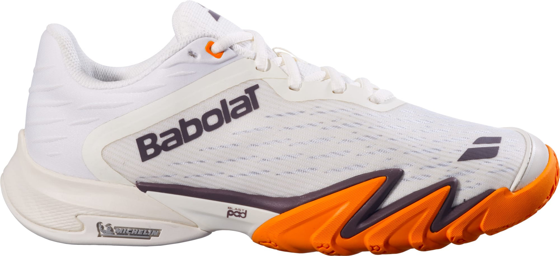 A side view of the Babolat Premura 3 Men's Padel Shoe in Cream and Orange by Babolat, featuring gray and orange accents, an orange outsole, and a distinctive zigzag midsole design, displayed against a plain white background.