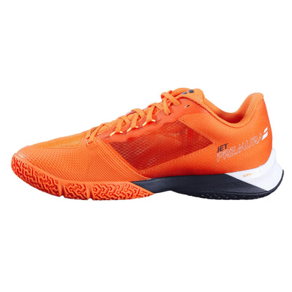 The Babolat Jet Premura 2 Men's Padel Shoes in Vibrant Orange feature a sleek design with a breathable mesh upper and "Jet Premura" on the side. The sole, made from durable Michelin rubber, has textured patterns for enhanced grip, making it ideal for padel.