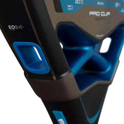 Close-up of the NOX AT10 Pro Cup Soft By Agustín Tapia 2026 Padel Racket handle in black and blue, featuring the "EOS FLAP" label and partial "PRO CUP SOFT" branding by NOX.