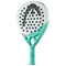 The "HEAD Gravity Motion 2024 Padel Racket - Mint" boasts a light teal handle and a white head complete with black circular holes. It is enhanced with Spin Surface technology, featuring the prominently visible HEAD brand logo and the word "Gravity" elegantly printed in black.