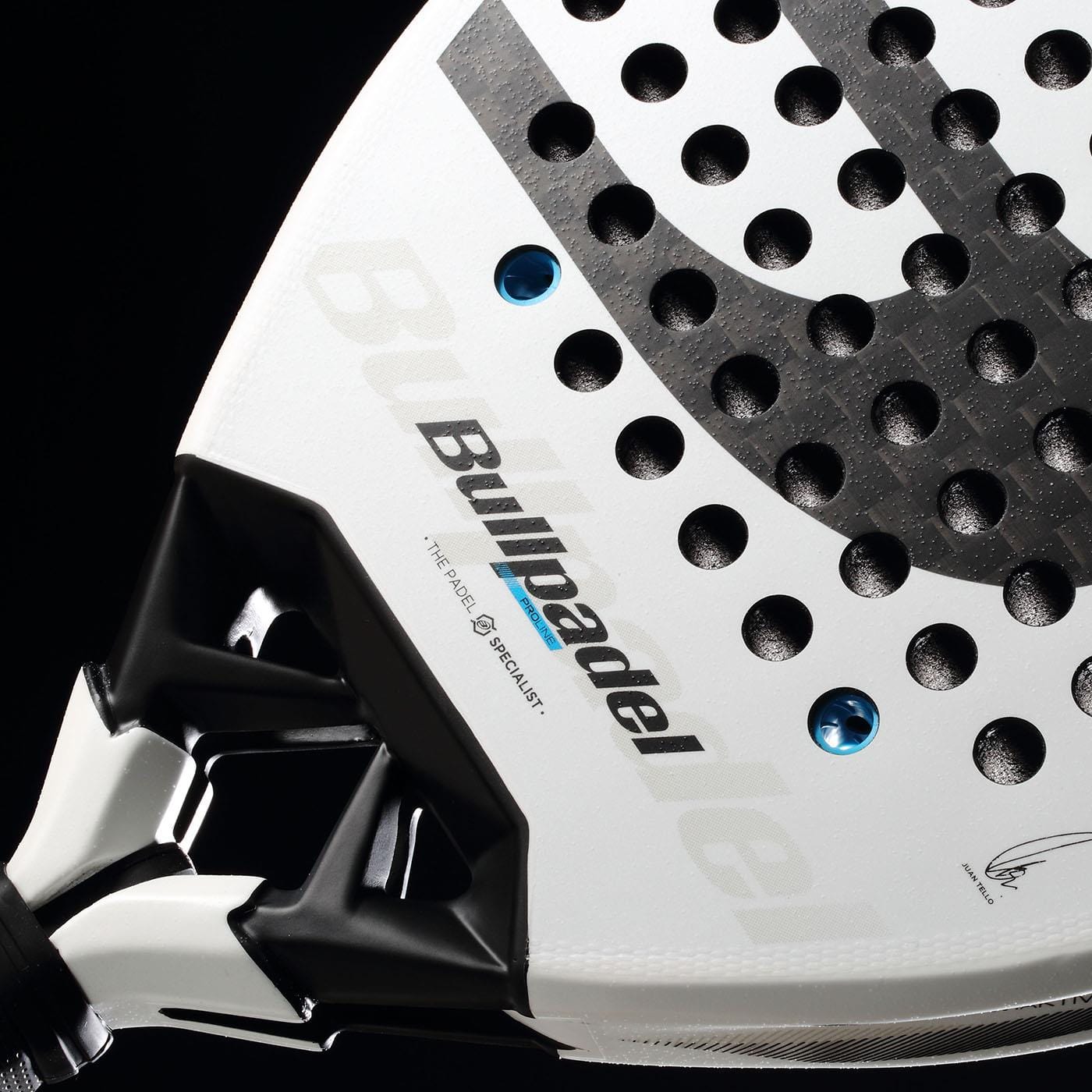 Close-up of the Bullpadel Vertex 05 2026 Padel Racket in white and black, featuring a perforated face, handle detail, and branding against a black background—ideal for high-performance players.