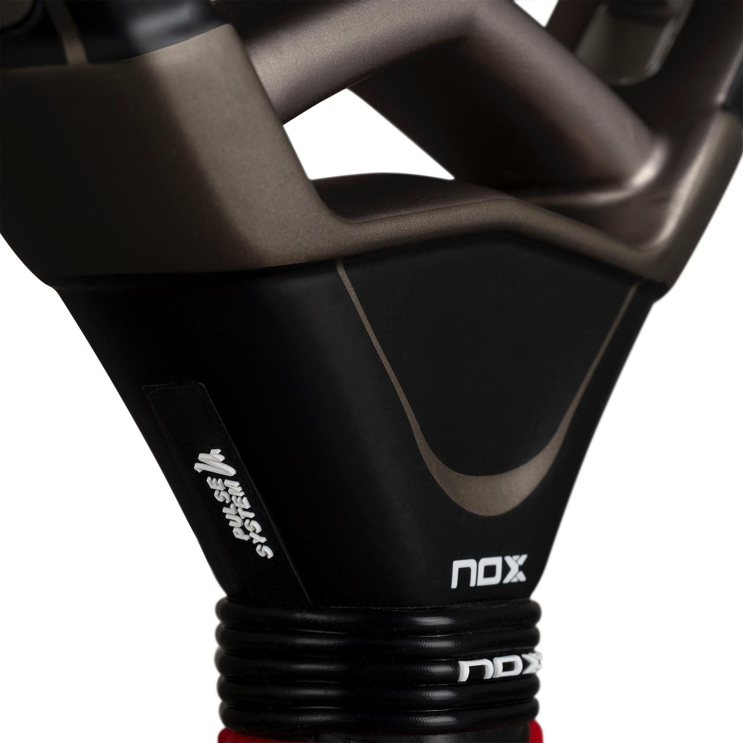 Close-up of the NOX AT10 Pro Cup Hard By Agustín Tapia 2026 Padel Racket by NOX, highlighting the handle, frame, and logo in bold black, grey, and red.