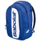 The Babolat Court Hero Padel Backpack in dark blue features two zip compartments, a white front panel with the bold Babolat logo, a side pocket icon, and is made from recycled PET materials.