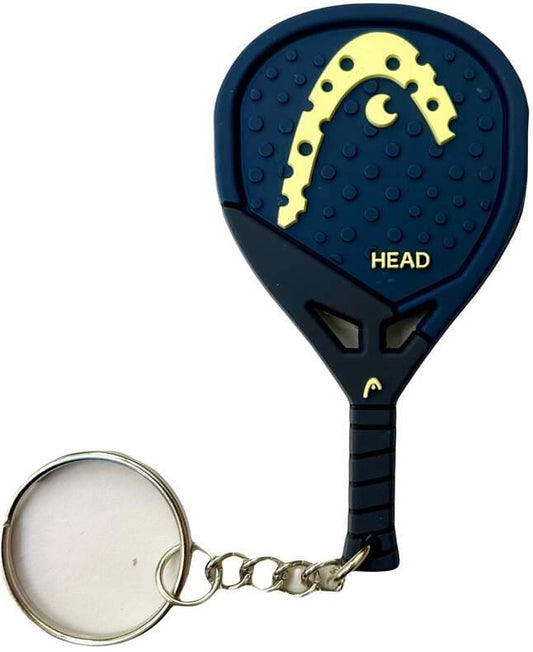 The HEAD Extreme 2026 Padel Racket Keyring is shaped like a blue and yellow padel racket with "HEAD" on it and features a circular metal key ring—perfect for any HEAD fan.
