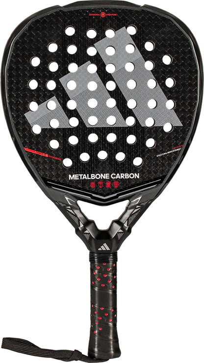 The adidas Metalbone Carbon 2026 Padel Racket features a black carbon fiber texture, large adidas logo, round holes, and "METALBONE CARBON" text. Designed for advanced players with a black grip handle accented in red.